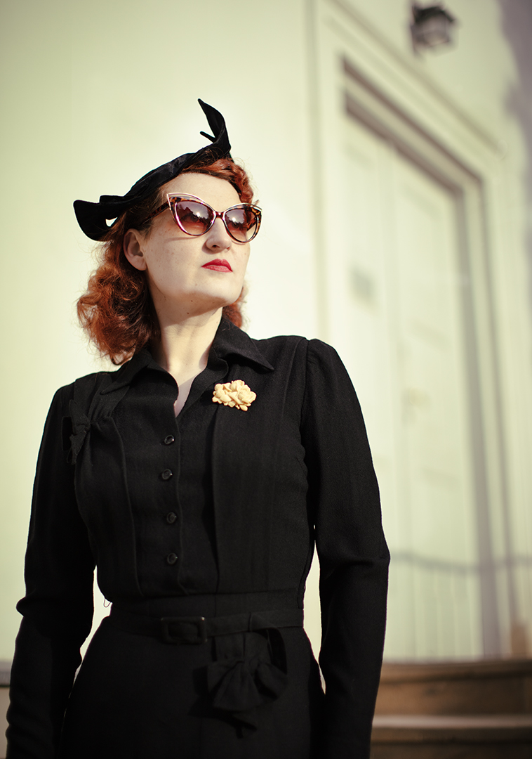 Vintage fashion model Dominique de Merteuil in a 1940s CC41 dress.
